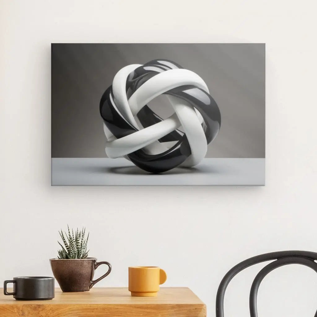 Œuvre géométrique moderne représentant des entrelacements noirs et blancs, créant un effet visuel dynamique et abstrait dans un style épuré.