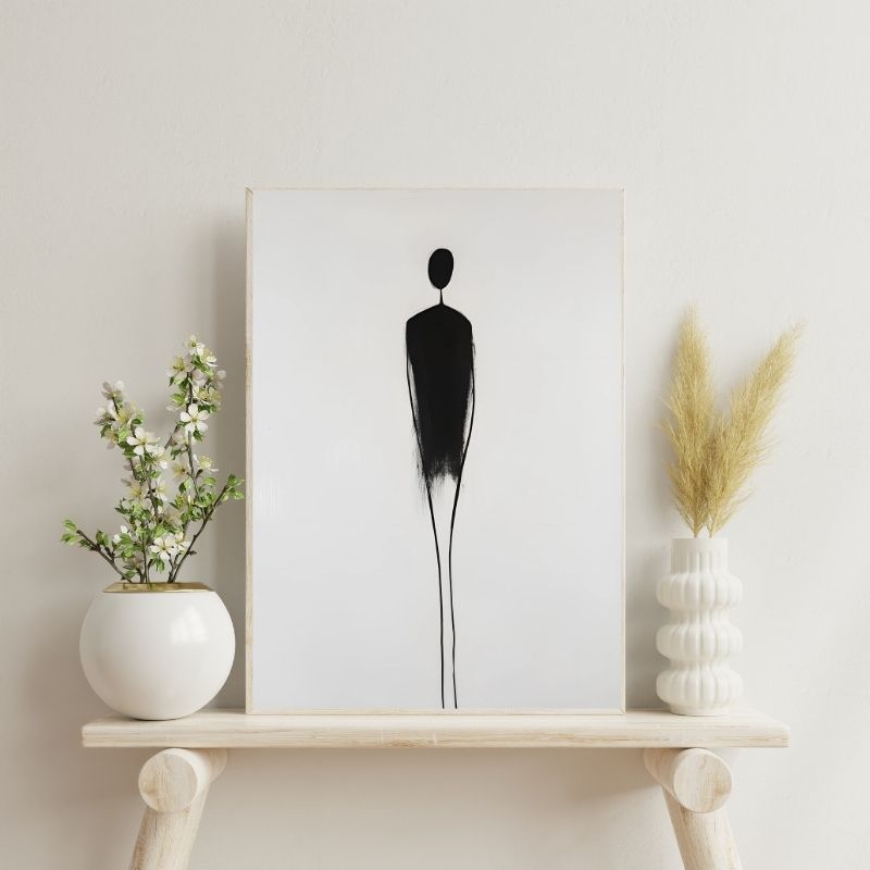 Tableau minimaliste représentant la silhouette d’un personnage, design moderne et épuré en noir et blanc