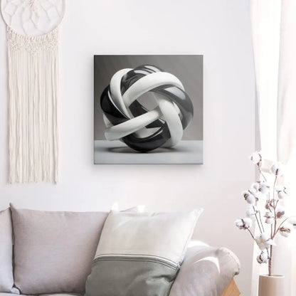Un tableau Tableau Géométrique Moderne Lacets Noirs et Blancs est accroché au mur du salon.