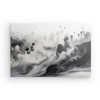 Peinture abstraite présentant des formes et des motifs fluides noirs, gris et blancs ressemblant à des vagues et des éclaboussures sur un fond blanc uni, mettant en valeur le subtil Tableau Abstrait Nuances de Gris Design Noir et Blanc.