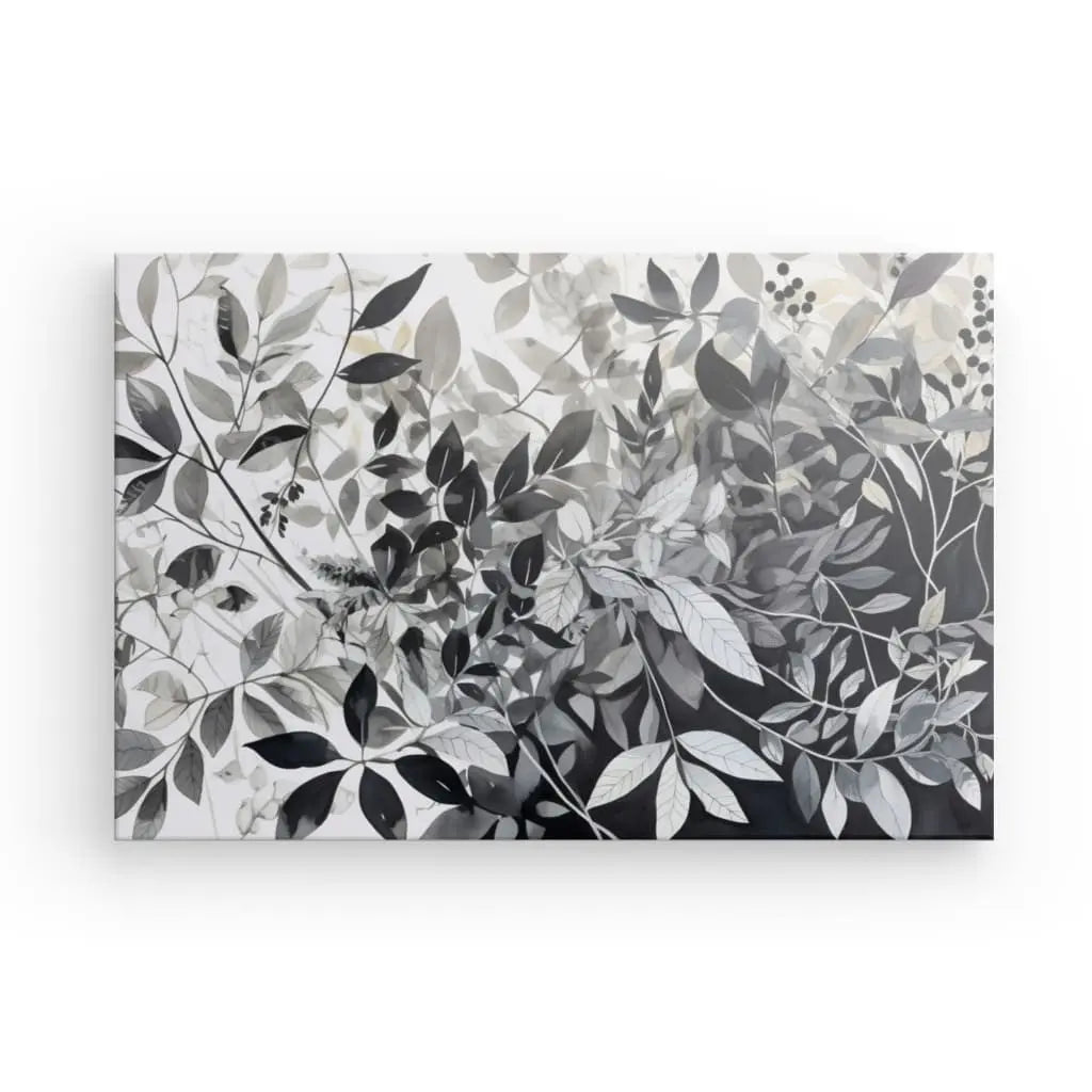 Un Tableau Plantes Feuilles Végétaux Nature Noir et Blanc rectangulaire présente diverses feuilles et feuillages dans des tons de noir, blanc et gris, créant un superbe motif botanique monochromatique parfait pour la décoration intérieure.