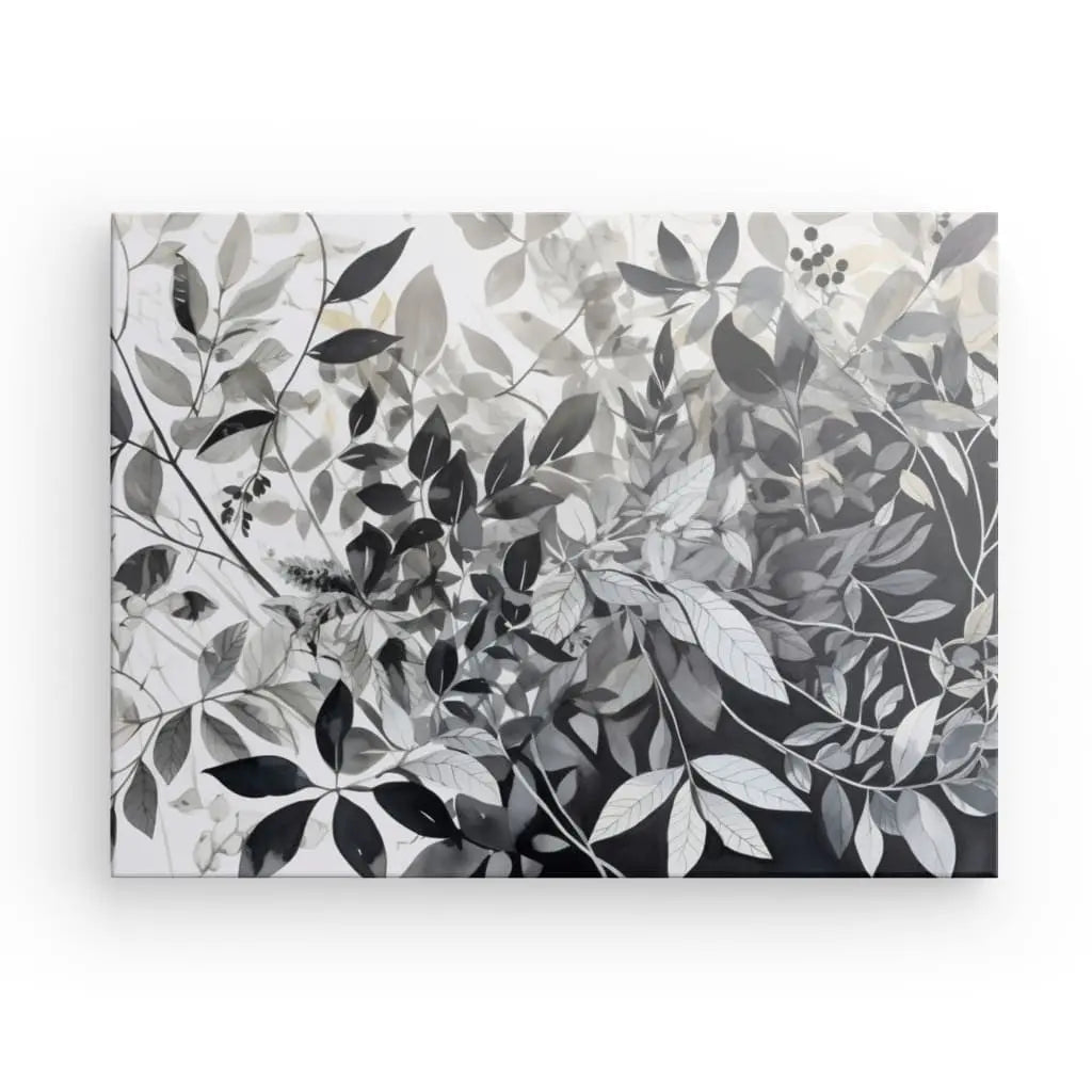 Illustration monochromatique présentant des feuilles noires, blanches et grises qui se chevauchent sur un fond dégradé, passant du clair en haut au foncé en bas. Ce Tableau Plantes Feuilles Végétaux Nature Noir et Blanc constitue une superbe pièce pour la décoration intérieure.