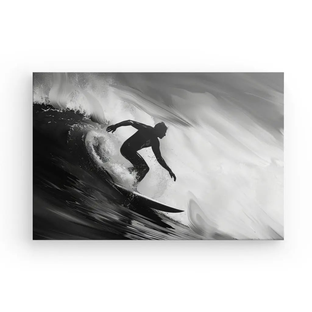 Silhouette d'une personne surfant sur une vague sur une photographie en noir et blanc. Le Tableau Surfeur Vague Rouleau Noir et Blanc capture le surfeur positionné à droite, chevauchant la crête de la vague, rappelant l'art vague noir et blanc.