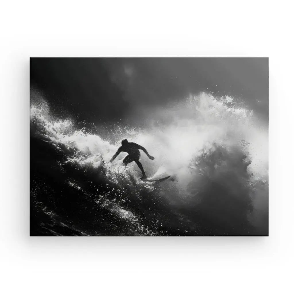 Une image en noir et blanc d'un surfeur intrépide surfant sur une grosse vague, capturée avec des détails époustouflants sur Tableau Surf Océan Noir et Blanc.