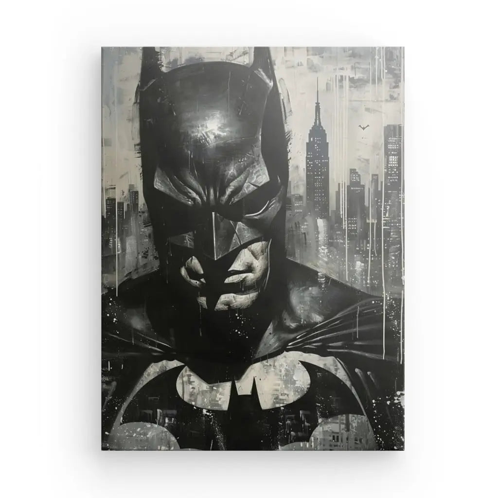 Présentation du Tableau Batman Peinture Noir et Blanc : une illustration saisissante de Batman avec une expression sévère, sur un paysage urbain granuleux avec des gratte-ciel, dont un qui ressemble à l'Empire State Building.