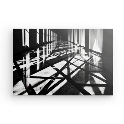 Black and white architectural artwork showcasing shadows and light patterns.