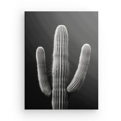 Découvrez l'élégance d'un décor minimaliste contemporain avec notre « Tableau Cactus Désert Monochrome Fond Noir », présentant une superbe photo en noir et blanc d'un grand cactus à trois bras verticaux sur un fond sombre, évoquant l'essence d'une œuvre d'art noir et blanc.