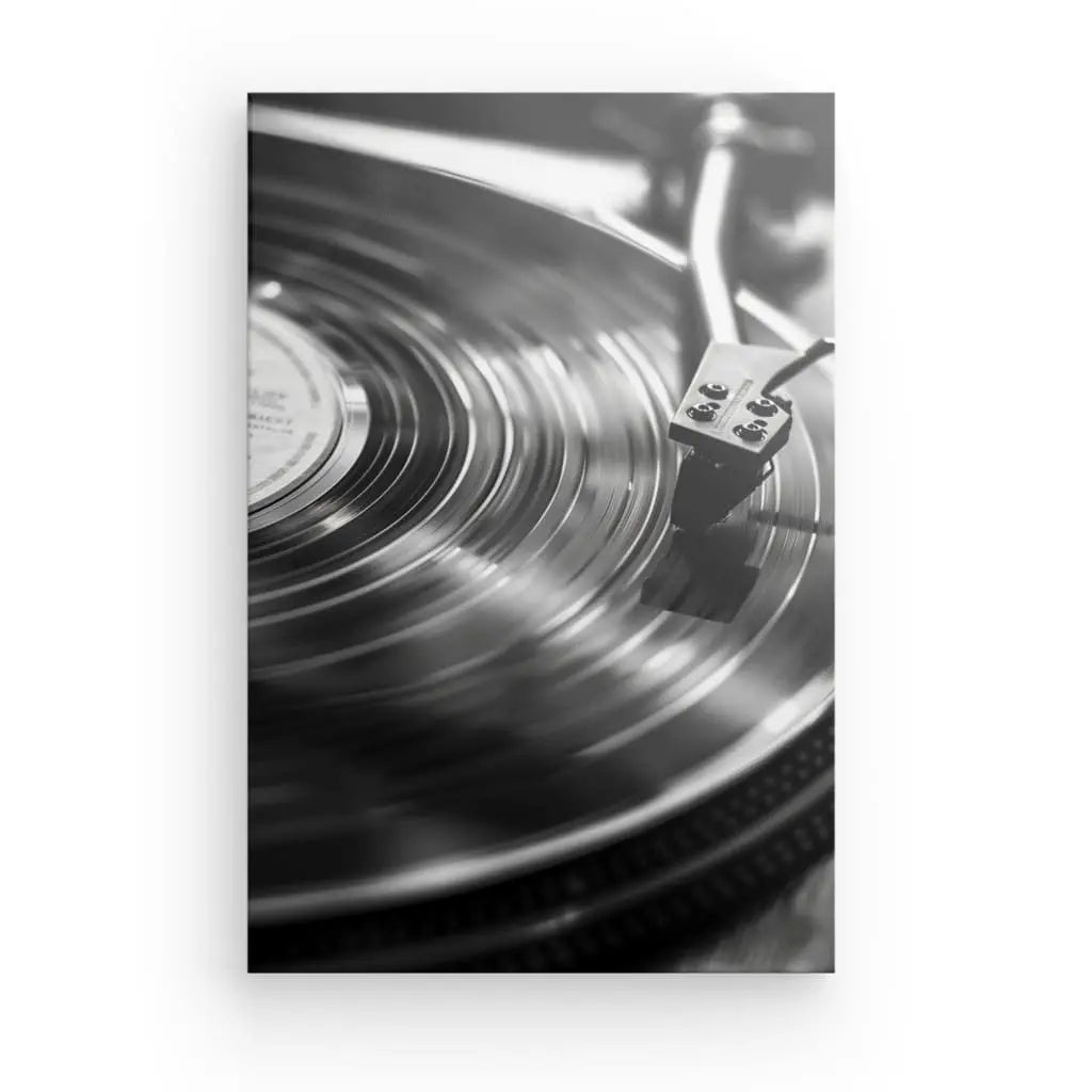 Tableau artistique de tourne-disque vinyle noir et blanc.