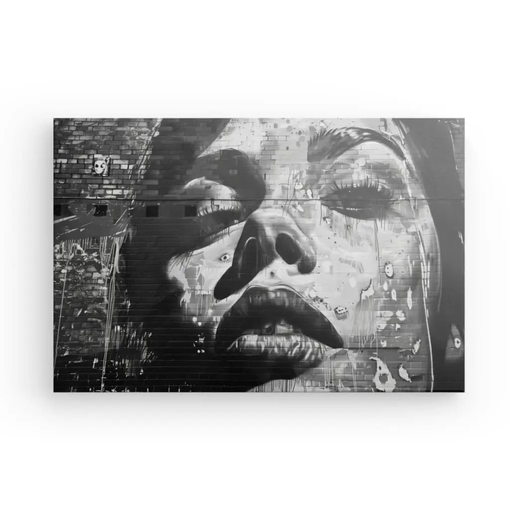 Mural art of a woman’s face in black and white.