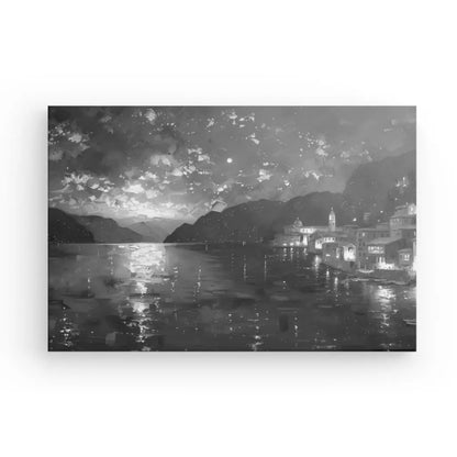 Tableau noir et blanc d'un lac et des montagnes au coucher du soleil.