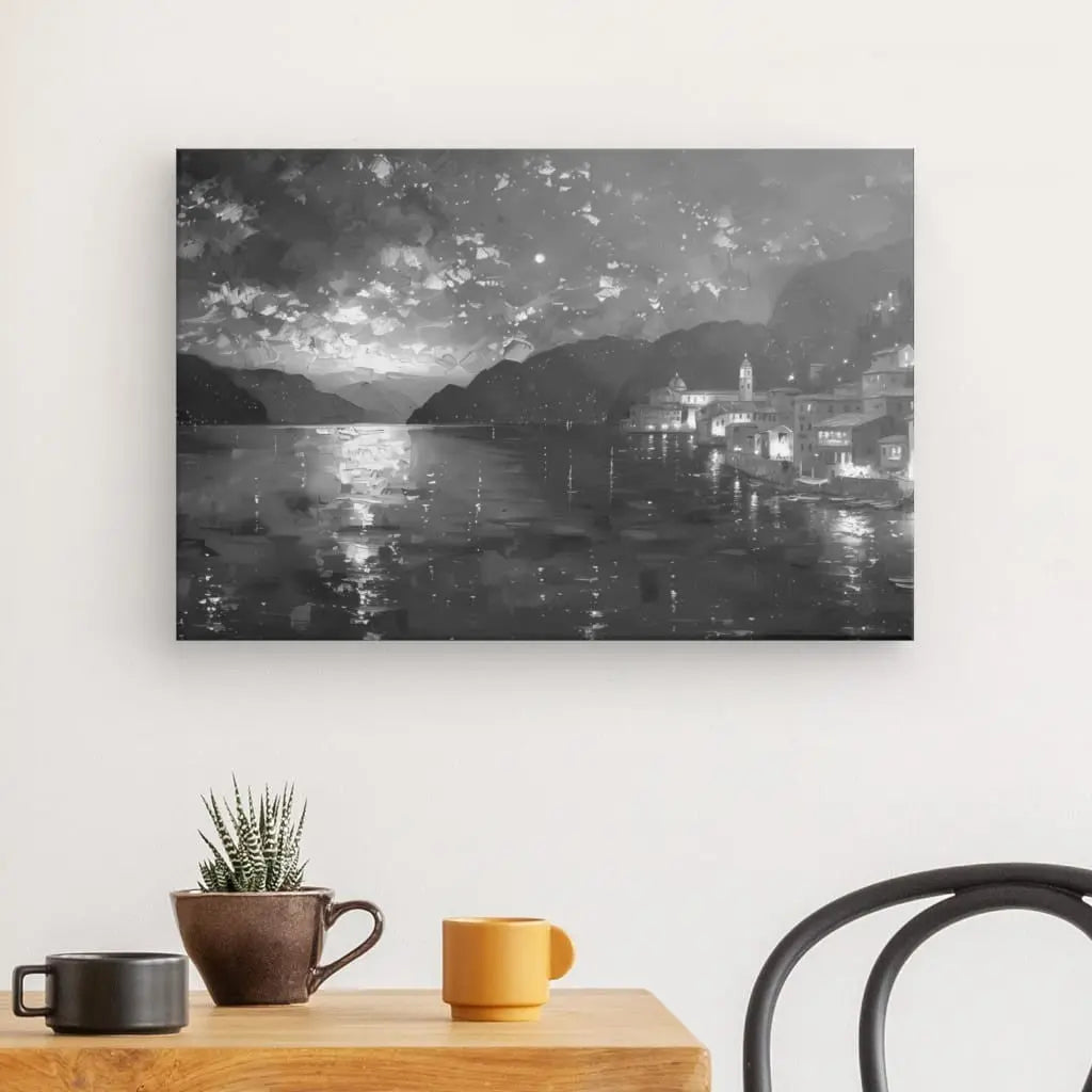 Tableau noir et blanc de paysages de lac et montagnes.