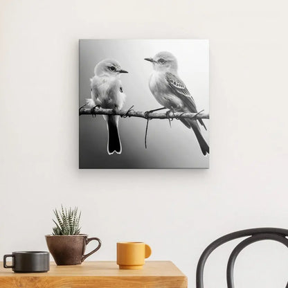 Tableau noir et blanc couple d'oiseaux sur une branche décoratif.