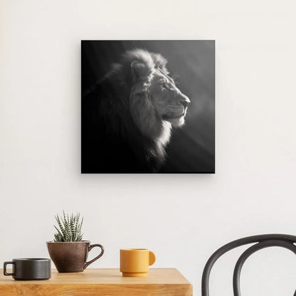 Tableau noir et blanc d'un lion en profil, décoration murale sauvage.