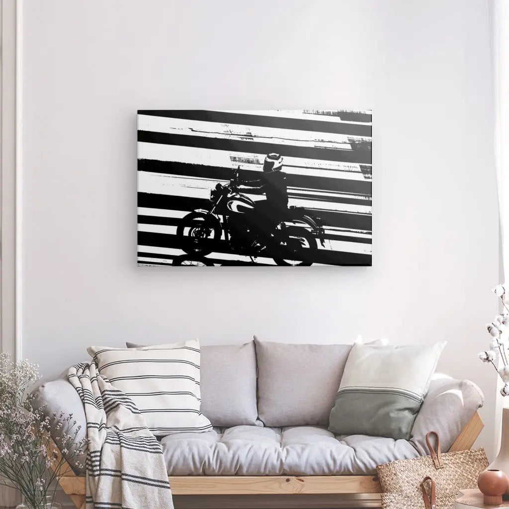 Tableau graphique noir et blanc d'un motard sur un passage piéton.