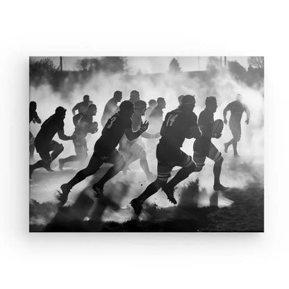 Rugby players running in black and white foggy atmosphere.