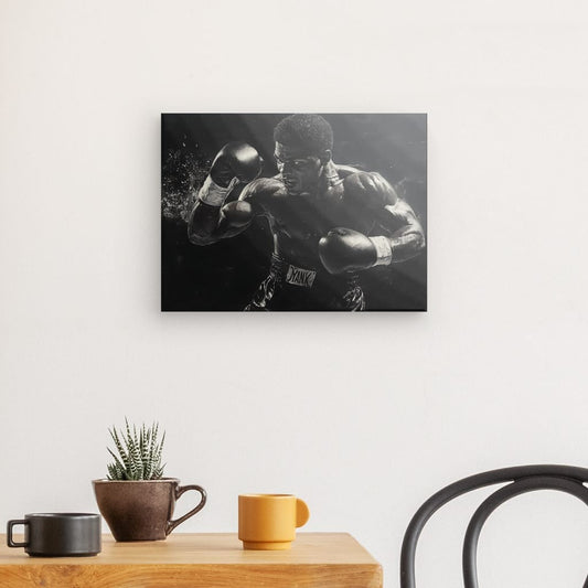 Tableau en noir et blanc d’un boxeur en plein uppercut, scène dynamique et puissante pour déco murale sportive









