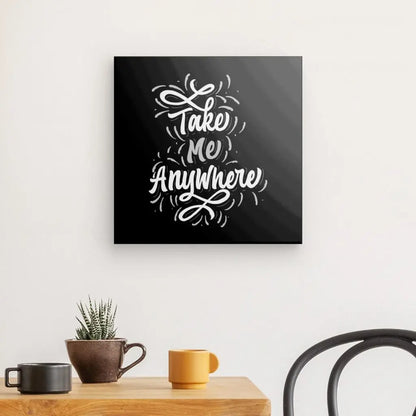 Tableau en noir et blanc avec la citation "Take me anywhere", message inspirant et poétique pour décoration murale