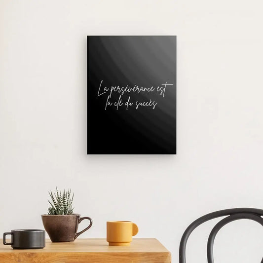 Tableau en noir et blanc avec la citation sur la persévérance et le succès, message inspirant et moderne pour décoration murale