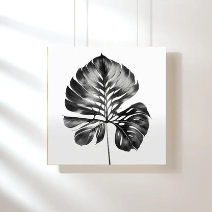 Tableau noir et blanc d’une feuille végétale naturelle, design sobre et organique