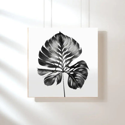 Tableau noir et blanc d’une feuille végétale naturelle, design sobre et organique