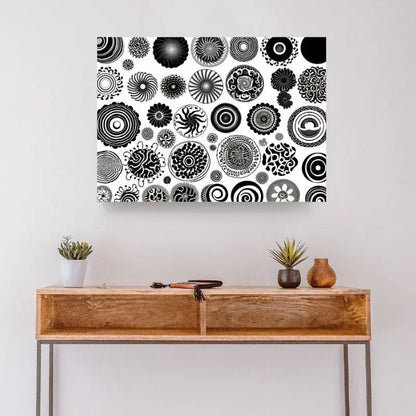 Tableau avec des formes géométriques noires sur fond blanc, design moderne et structuré