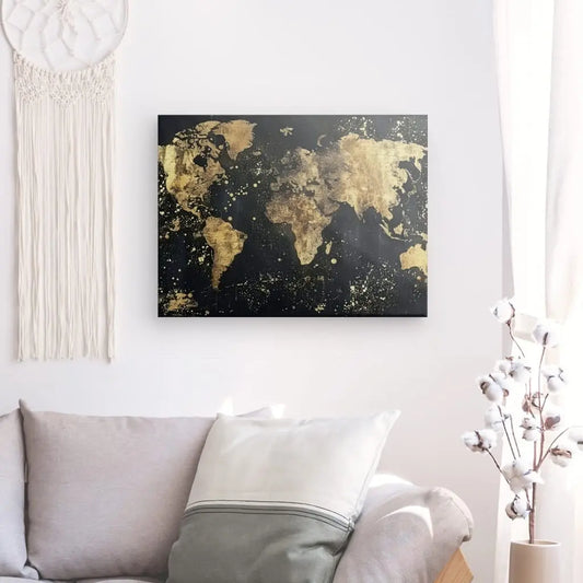 Tableau représentant une mappemonde dorée et noire, œuvre élégante et sophistiquée pour décoration murale moderne