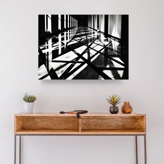 Tableau en noir et blanc d’une architecture jouant sur l’ombre et la lumière, œuvre moderne et graphique pour décoration murale