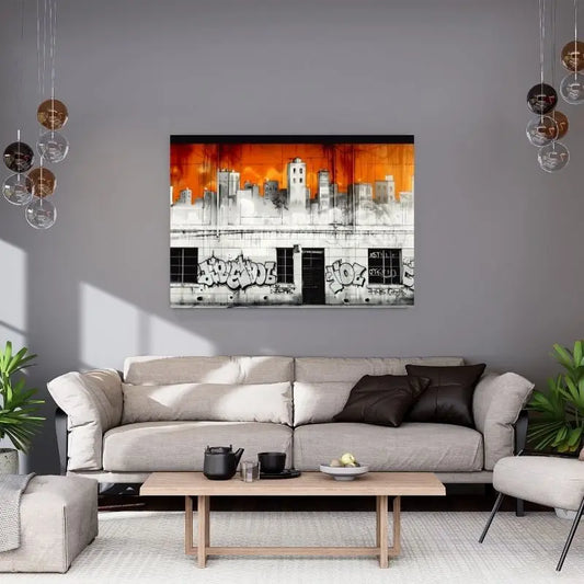 Tableau urbain représentant un tag en noir, blanc et orange, œuvre moderne et audacieuse pour décoration murale contemporaine