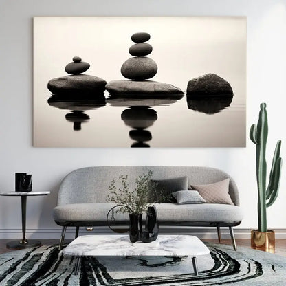 Pile de pierres cairns en noir et blanc dans un style zen minimaliste, évoquant la relaxation, la paix intérieure et l’harmonie visuelle.