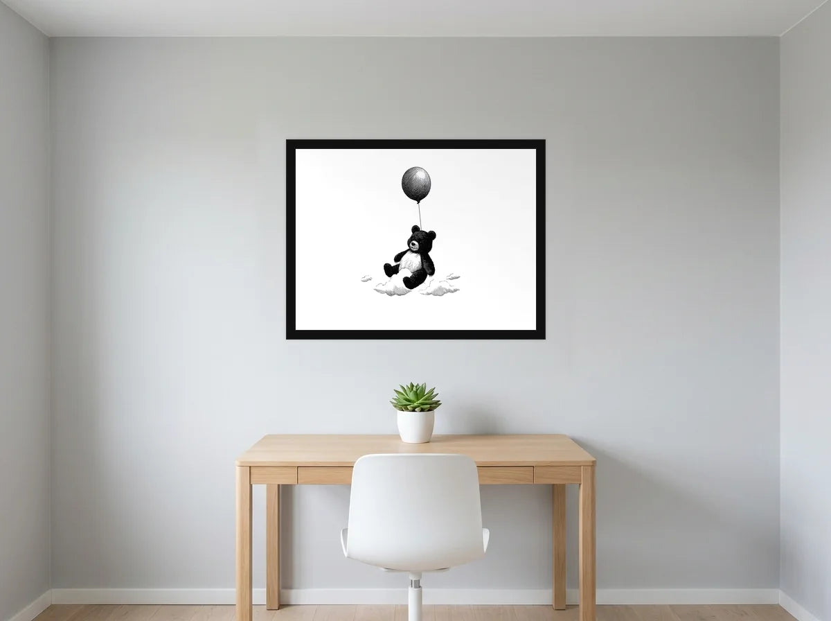 Poster ourson au ballon noir et blanc encadré noir, présenté dans : bureau gris clair lumineux