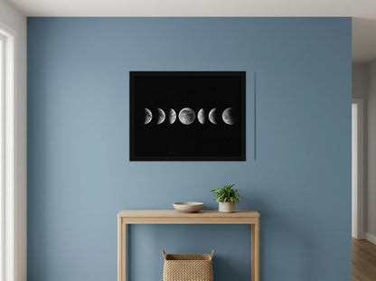 Poster encadré noir phases de lune noir et blanc, présenté dans un intérieur contemporain
