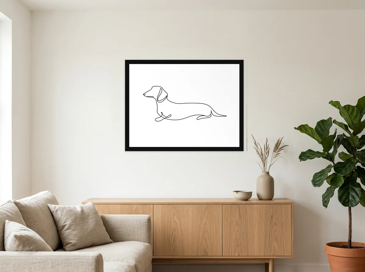 Poster encadré noir teckel au trait continu noir et blanc, présenté dans un intérieur contemporain