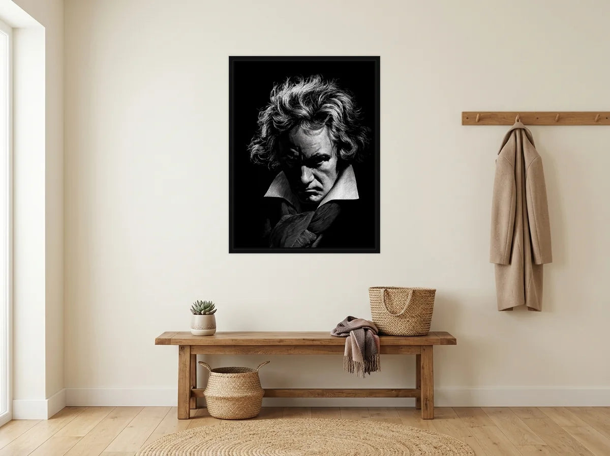 Tableau beethoven en clair-obscur noir et blanc en toile encadrée noire, présenté dans : entrée crème avec banc en bois