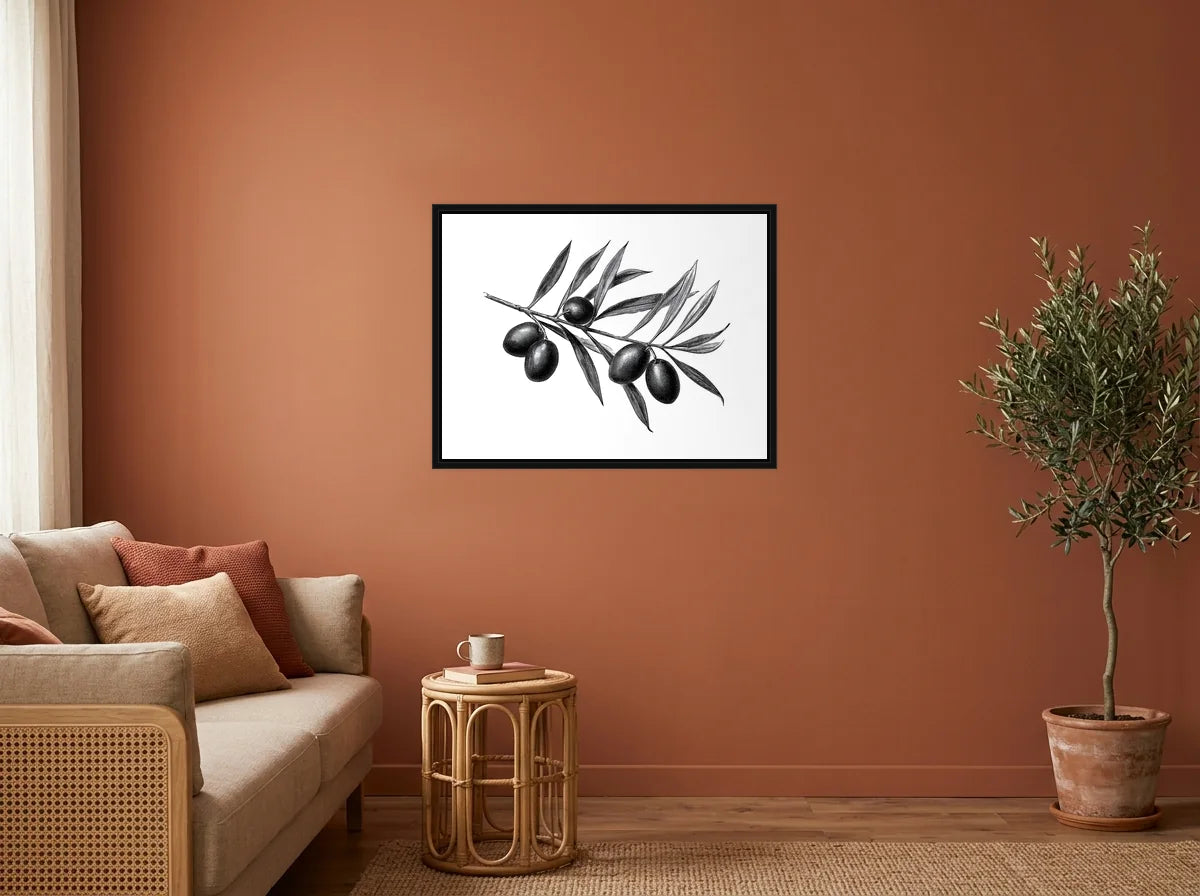 Tableau Branche d’Olivier noir et blanc en toile encadrée noire, présenté dans : salon aux murs terracotta