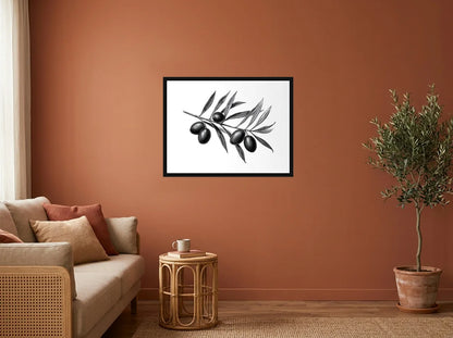 Tableau Branche d’Olivier noir et blanc en toile encadrée noire, présenté dans : salon aux murs terracotta