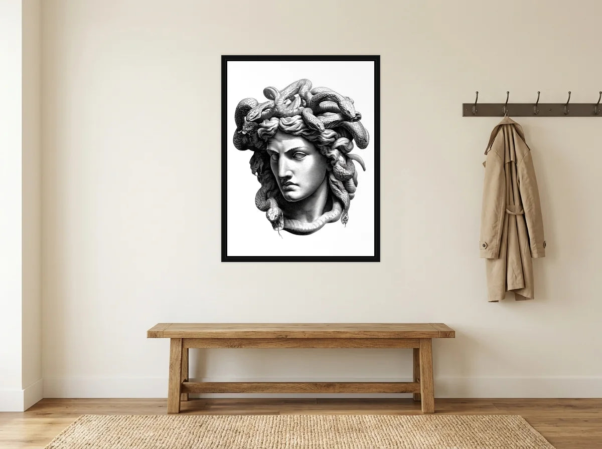 Tableau méduse aux serpents noir et blanc en toile encadrée noire, présenté dans : entrée crème avec banc en bois