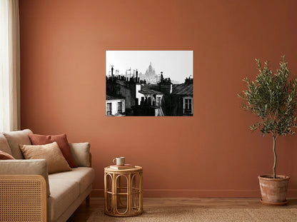 Tableau toits de montmartre noir et blanc sur toile 2 cm, présenté dans un salon aux murs terracotta