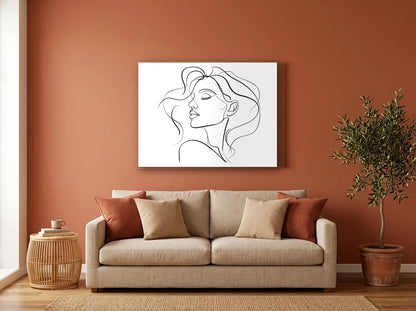 Tableau visage féminin au trait noir et blanc sur toile 2 cm, présenté dans un intérieur coloré